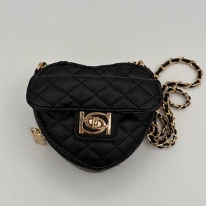 Chic Black Quilted Heart Bag. BEBE NWT unique and beautiful crossbody